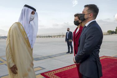 Minister of Economy, Abdulla bin Touq, greets Volodymyr Zelenskiy, President of Ukraine, at the presidential terminal at Abu Dhabi International Airport. Mohamed Al Hammadi / Ministry of Presidential Affairs