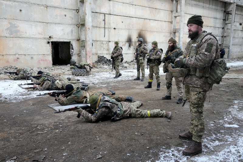 Belarusian volunteers receive military training at the Belarusian Company base in Kyiv, Ukraine. Hundreds of Belarusians have arrived in Ukraine to help the Ukrainian army fight against the Russians. AP