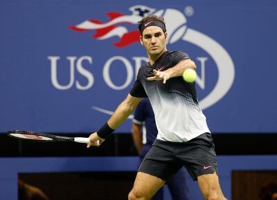 FILE - In this Sept. 4, 2017, file photo, Roger Federer, of Switzerland, makes a return against Philipp Kohlschreiber, of Germany, in a fourth-round match at the U.S. Open tennis tournament in New York. When Federer won five straight U.S. Opens, he used to arrive in New York knowing he had all the answers. Itâ€™s been 10 years since the last one, but at 37 Federer believes heâ€™ll be sharp enough to navigate a difficult draw and compete for another championship when main-draw play at the yearâ€™s final Grand Slam tournament begins Monday. (AP Photo/Kathy Willens, File)