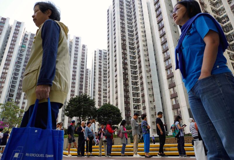 Long lines formed outside Hong Kong polling stations. AP Photo