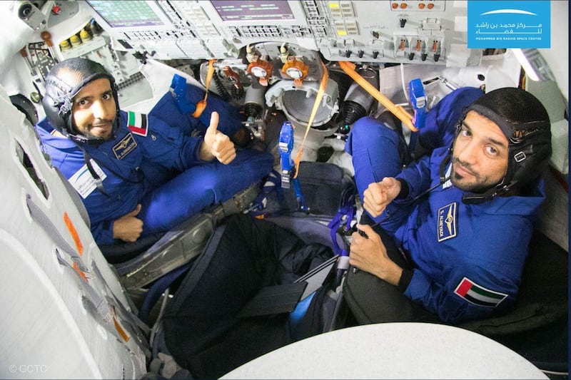 Hazza Al Mansouri and Sultan Al Neyadi undergo simulation training in the Russian Soyuz spacecraft that will take them to the International Space Station next year. Courtesy Mohammed bin Rashid Space Centre