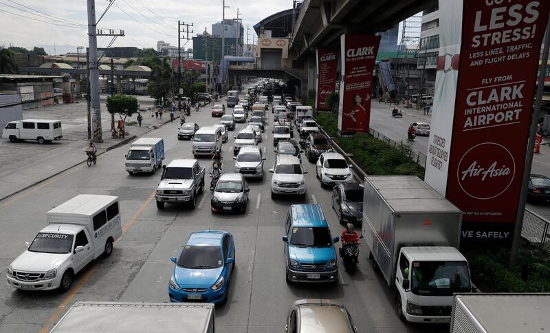 Traffic builds up during the first day of a more relaxed coronavirus lockdown in Manila. AP Photo