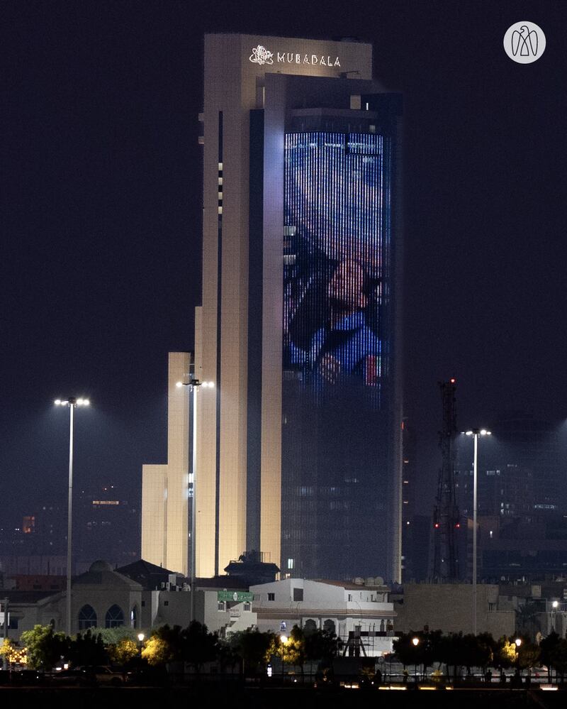 The Mubadala building in Abu Dhabi is lit up to mark Sultan Al Neyadi's return to Earth from the International Space Station. Photo: Abu Dhabi Media Office