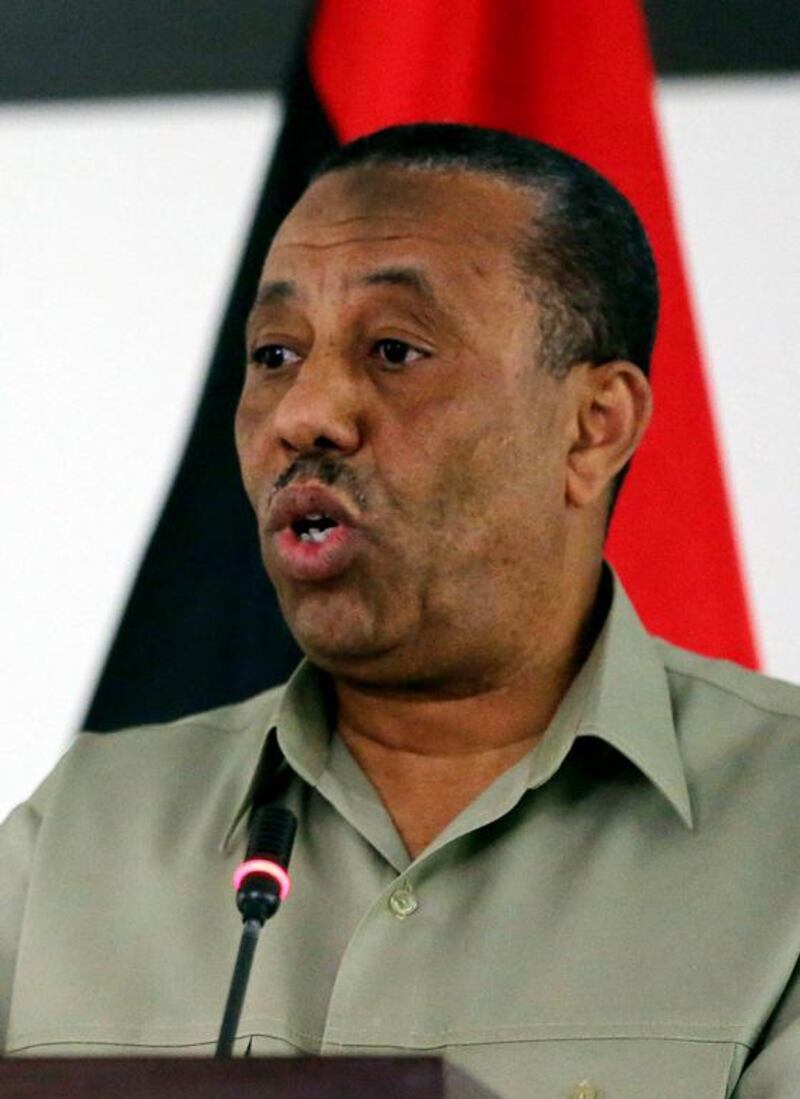 Libya’s interim prime minister Abdullah Al Thani ordered the regular military to control any armed groups in Benghazi, where irregular forces backed by helicopters clashed with Islamist militias. Mahmud Turkia / AFP / May 16, 2014

