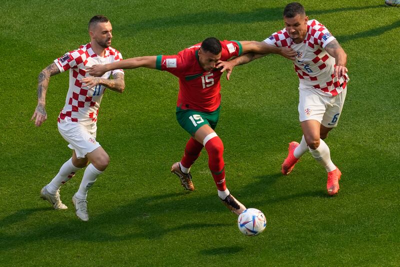 (L-R) Marcelo Brozovic, Selim Amallah and Dejan Lovren vie for the ball as Morocco and Croatia drew 0-0. AP