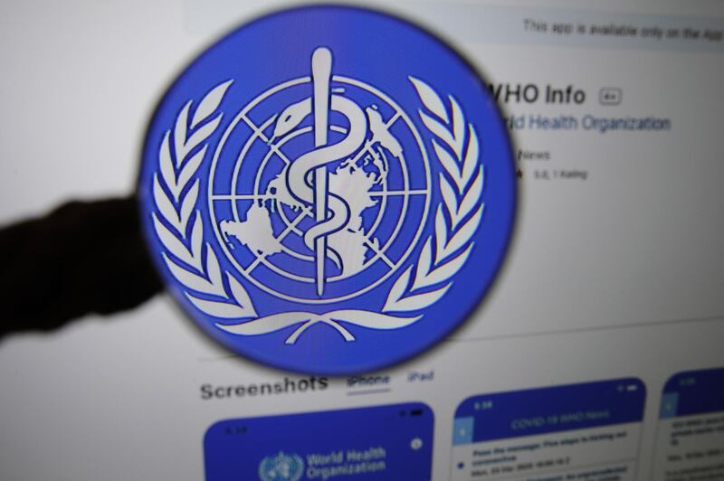 The logo for the World Health Organization (WHO) WHO Info application is displayed on a computer screen in an arranged photograph taken in Bern, Switzerland, on Tuesday, March 31, 2020. The Covid-19 pandemic has triggered a seismic wave of health awareness and anxiety, which is energizing a new category of virus-fighting tech and apps. Photographer: Stefan Wermuth/Bloomberg