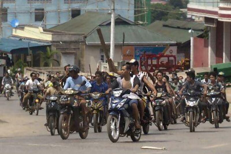 Sectarian violence has spread to a new region of Myanmar, with hundreds of Buddhists on motorcycles armed with sticks patrolling the streets of  Lashio, northern Shan State.