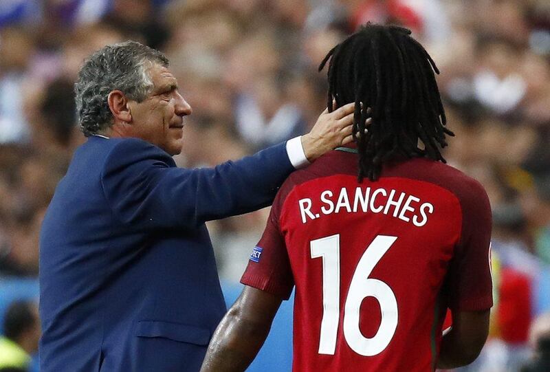 Portugal’s Renato Sanches is congratulated by head coach Fernando Santos as he is substituted during the Uefa Euro 2016 Final at the Stade de France, 10 July 2016. Kai Pfaffenbach / Reuters