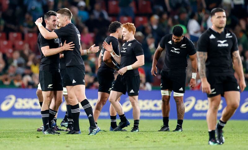 New Zealand players celebrate after their victory against South Africa. AFP