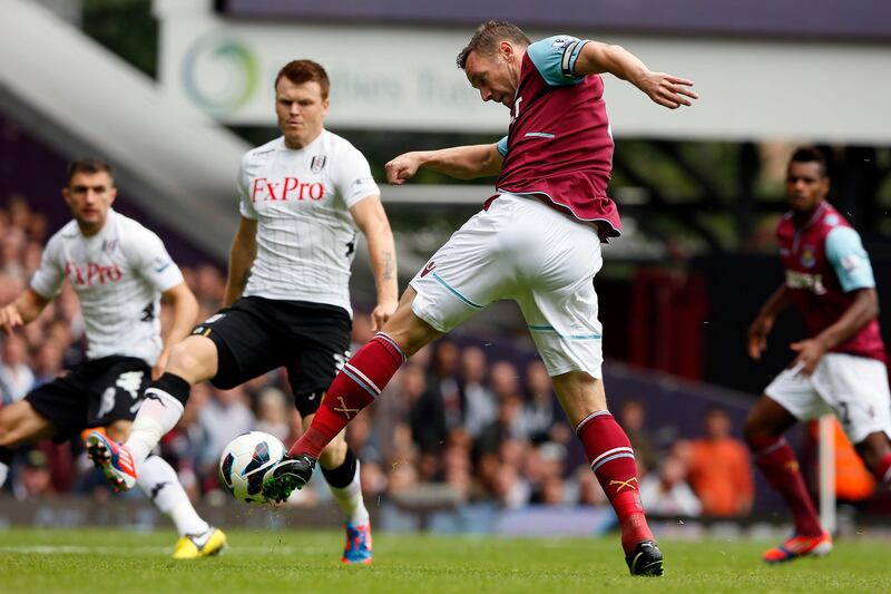 West Ham United's Kevin Nolan shoots to score against Fulham during their English Premier League soccer match at Upton Park in London September 1, 2012. REUTERS/Stefan Wermuth (BRITAIN - Tags: SPORT SOCCER) NO USE WITH UNAUTHORIZED AUDIO, VIDEO, DATA, FIXTURE LISTS, CLUB/LEAGUE LOGOS OR "LIVE" SERVICES. ONLINE IN-MATCH USE LIMITED TO 45 IMAGES, NO VIDEO EMULATION. NO USE IN BETTING, GAMES OR SINGLE CLUB/LEAGUE/PLAYER PUBLICATIONS. FOR EDITORIAL USE ONLY. NOT FOR SALE FOR MARKETING OR ADVERTISING CAMPAIGNS *** Local Caption ***  SWT01_SOCCER-ENGLAN_0901_11.JPG