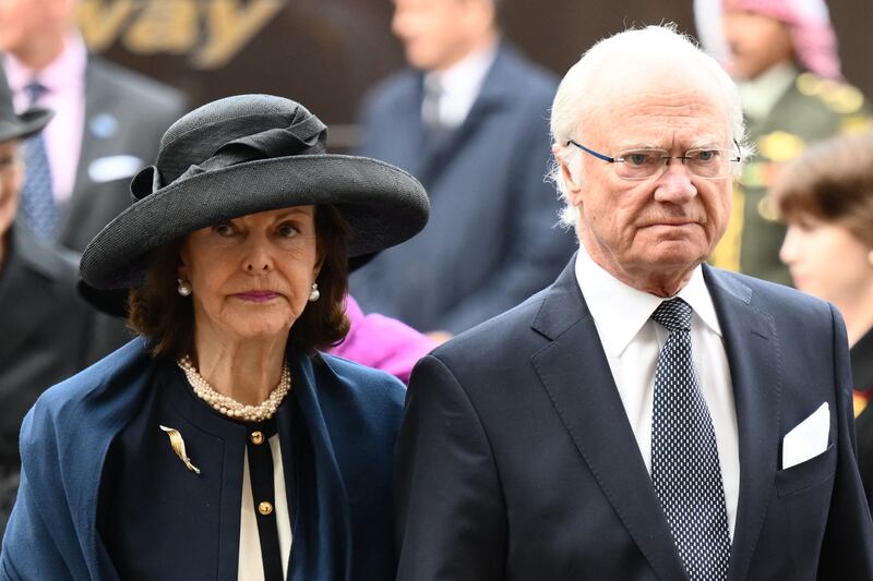 Sweden's Queen Silvia and King Carl XVI arrive. AFP