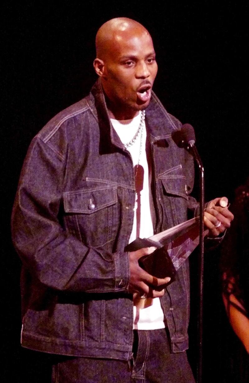 377433 01: DMX accepts the award for Favorite Rap/Hip Hop artist during a live broadcast of the 27th Annual American Music Awards show January 17, 2000 at the Shrine Auditorium in Los Angeles, California. (Photo by Chris Martinez/OnlineUSA)