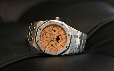 A 39mm salmon dial Royal Oak by Audemars Piguet, in solid platinum. Pawan Singh / The National