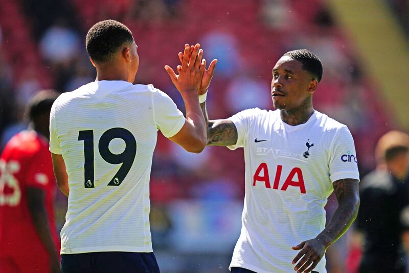 Dane Scarlett, left, after scoring for Spurs.