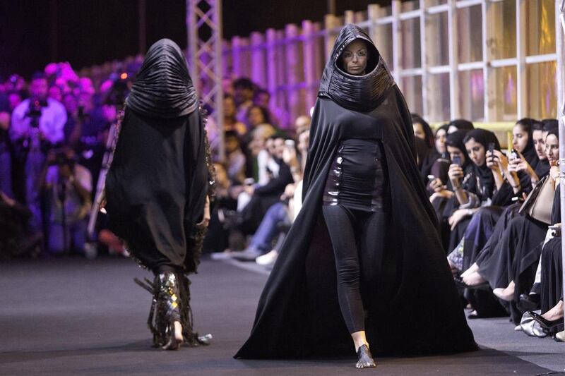 Abeer Al Suwaidi’s abayas on the catwalk. Jaime Puebla / The National

