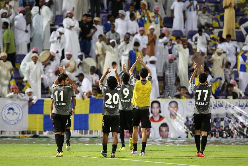 
AL AIN , UNITED ARAB EMIRATES Ð Sep 4 :  Players of Al Dhafra celebrating after won the match against Sharjah by 1-0 in the Pro League round robin tournament football match between Sharjah vs Al Dhafra at Tahnoun Bin Mohammed Stadium in Al Ain. ( Pawan Singh / The National ) For Sports

