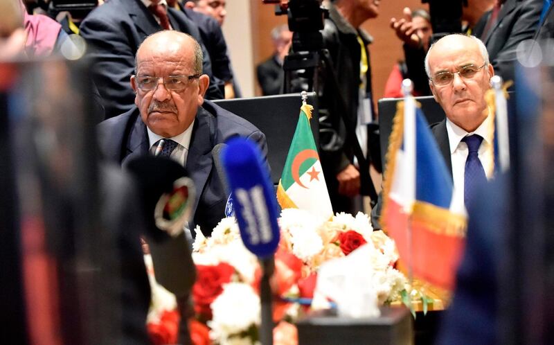 Algeria's Foreign Minister Abdelkader Messahel (L) and Energy and Mining Minister Youcef Yousfi (R) attend the fourth session of the Algerian-French Joint Economic Committee (COMEFA) at the Abdelatif Rahal International Conference Centre in the capital Algiers on November 12, 2017. / AFP PHOTO / RYAD KRAMDI