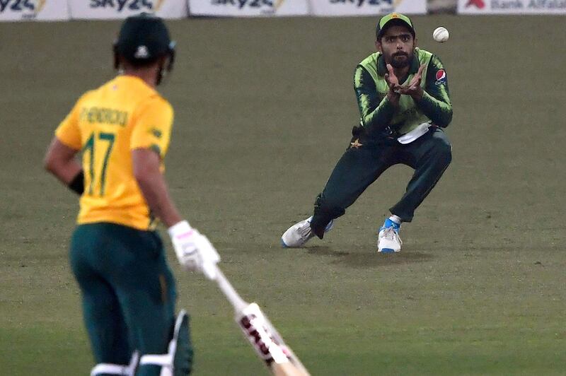 Pakistan's captain Babar Azam takes a catch of South Africa's Jon-Jon Smuts. AFP