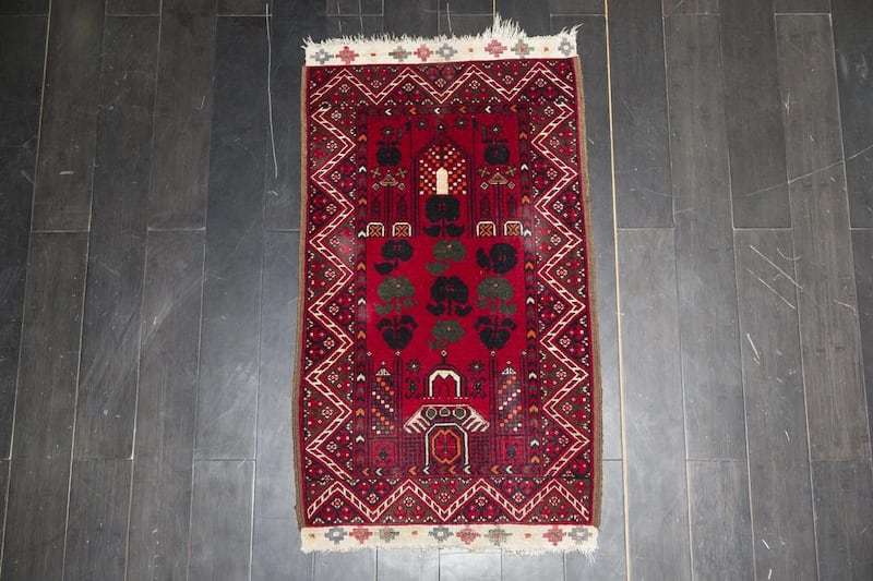 Afghan Kunduz prayer rug wool and silk, 80 years old.  Antonie Robertson / The National