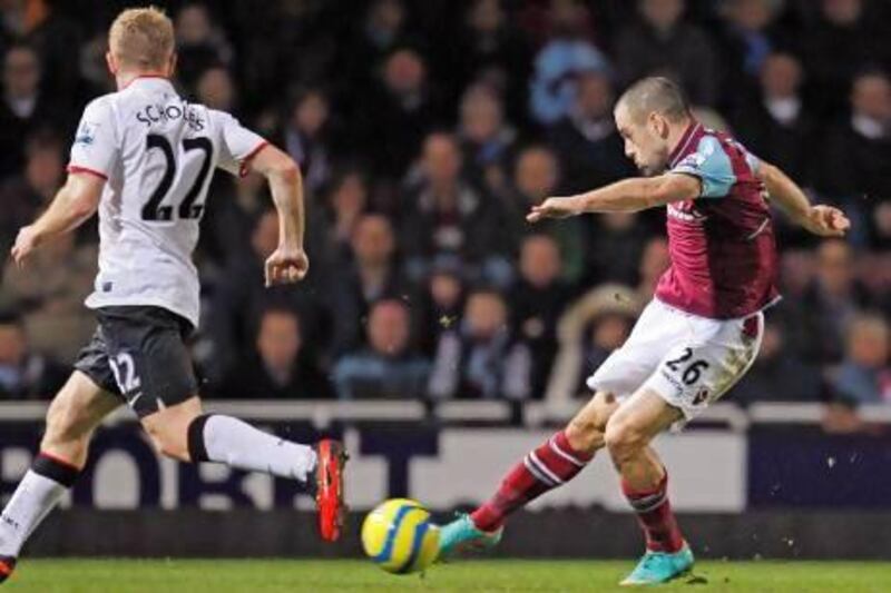 Joe Cole set up both of West Ham United's goals but it was not enough to gain victory over Manchester United in the FA Cup.