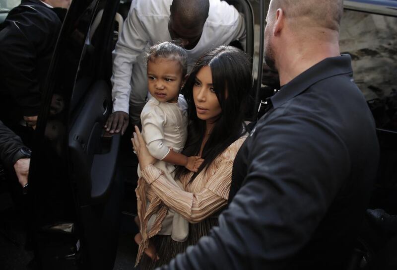 Kim Kardashian with North West. Ahmad Gharabli  / AFP 