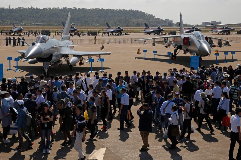 A J-10B, left, and JH-7A fighter jets of the Chinese People's Liberation Army (PLA) Air Force are displayed during the 12th China International Aviation and Aerospace Exhibition. AP Photo