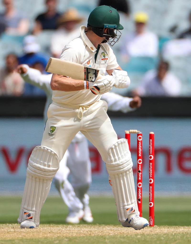 Australia's Steve Smith looks back to see he is out bowled around his legs by Jasprit Bumrah at the Melbourne Cricket Ground. AP