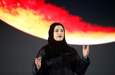 epa08999312 UAE's Minister of State for Advanced Technology Sarah al-Amiri speaks during the event of the arrival of the Hope Probe to Mars orbit at Burj Plaza, in front of the world's tallest building of Burj Khalifa, in the Gulf emirate of Dubai, United Arab Emirates, 09 February 2021. The Emirates Mars Mission Hope Probe is the first planetary mission led by an Arab-Islamic country and the space probe is to study the Martian atmosphere.  EPA/ALI HAIDER