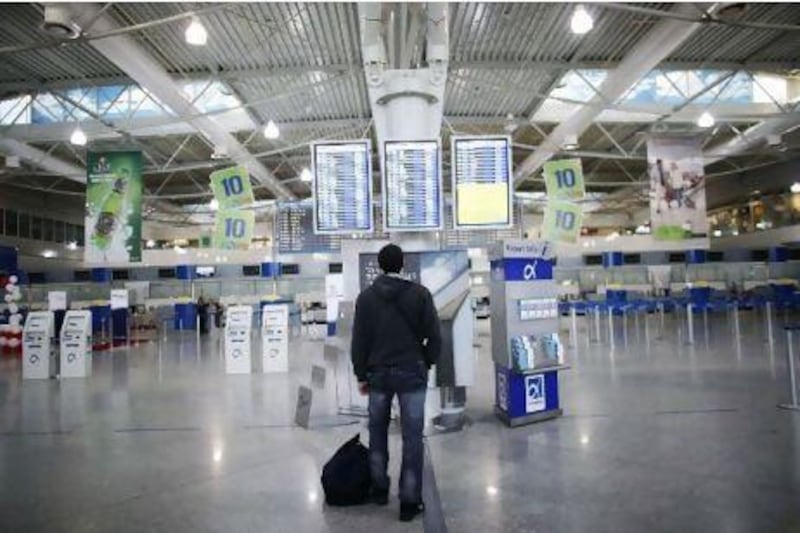The departure hall of Athens' International airport during a 24 hour-general strike yesterday. Angelos Tzortzinis / TOPSHOTS / AFP PHOTO