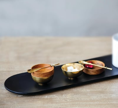 Come Cheeni is a brass container with a wooden lid designed to contain and serve sugar, condiments, sweet or savoury mouth fresheners. Courtesy Ayush Kasliwal