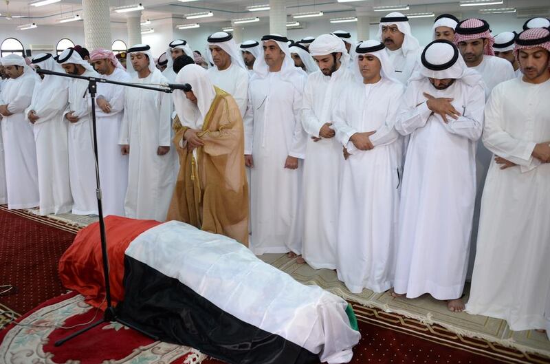 Sheikh Saif bin Zayed, Deputy Prime Minister and Minister of Interior, Sheikh Saud bin Saqr Al Qasimi, Ruler of RAK, and Sheikh Hazza bin Zayed, National Security Adviser, pray for First Lt Al Shehi at his funeral. Courtesy Security Media 