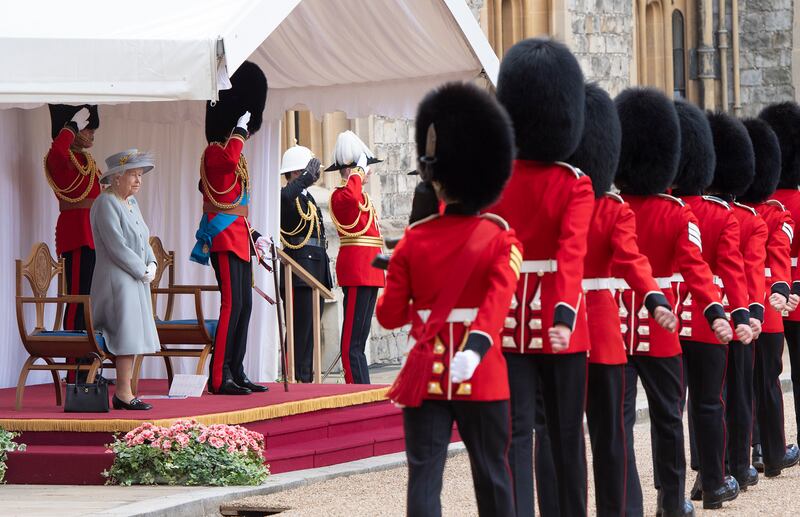 Queen Elizabeth attends a military ceremony in the quadrangle of Windsor Castle to mark her official birthday in June.