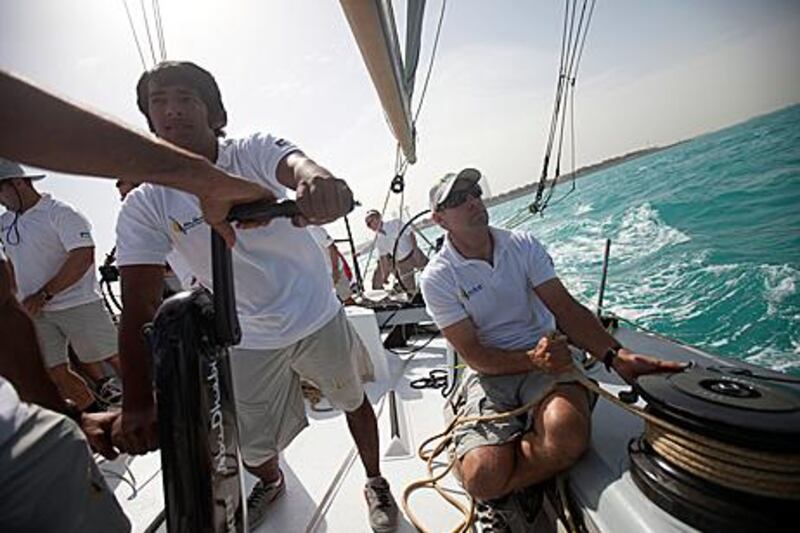 Adil Khalid, left, during a March 8 practice. Khalid and fellow Emirati Butti al Muhairi, along with some Abu Dhabi Ocean Race crew, helped sail Freefire to a win in the San Fernando Race yesterday.