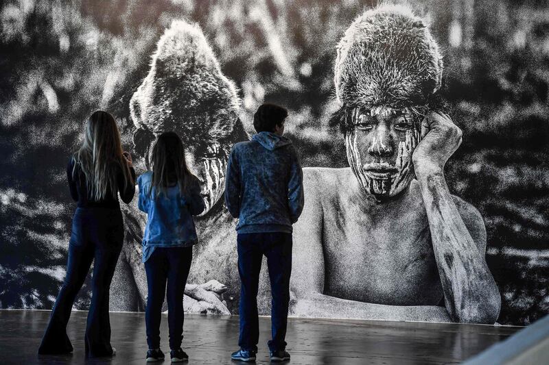 People visit the 33th Biennale of Sao Paulo at Ibirapuera park in Brazil. AFP