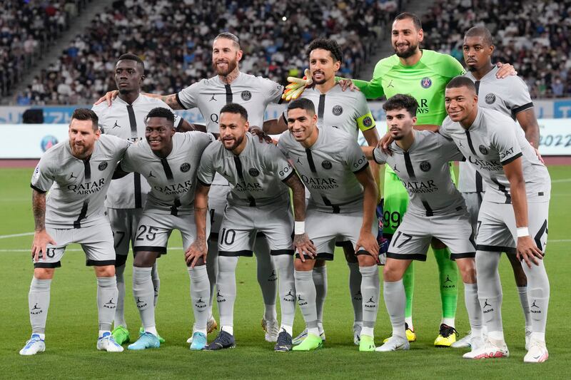 The Paris Saint-Germain players line-up before the match. AP