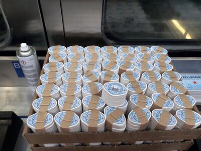 Labels sit waiting to be put on bottles of carbonated mineral water at the plant in San Pellegrino in Italy. Photo by Simone Filippetti