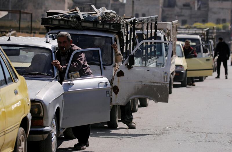 FILE PHOTO: Cars stand in line at a gasoline station as they wait to fuel up in Aleppo, Syria April 11, 2019. Picture taken April 11, 2019. REUTERS/Omar Sanadiki/File Photo