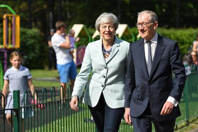 SONNING, UNITED KINGDOM - MAY 23:  British Prime Minister Theresa May and her husband Philip arrive at her local constituency polling station to vote in the European Elections on May 23, 2019 in Sonning, United Kingdom. Polls are open for the European Parliament elections. Voters will choose 73 MEPs in 12 multi-member regional constituencies in the UK with results announced once all EU nations have voted. (Photo by Leon Neal/Getty Images) *** BESTPIX ***