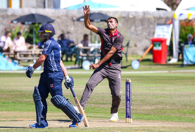 UAE bowler Sabir Ali in action against Scotland.