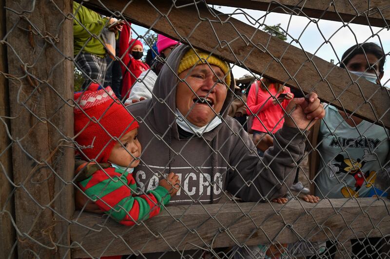 A woman cries during an eviction at Tierra del Padre, a Lenca indigenous community between Ojojona and San Buenaventura, in Honduras. AFP