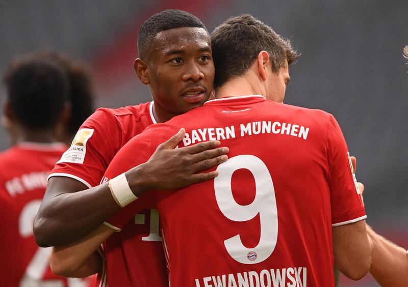 David Alaba (L) and Bayern's Robert Lewandowski celebrate. Getty
