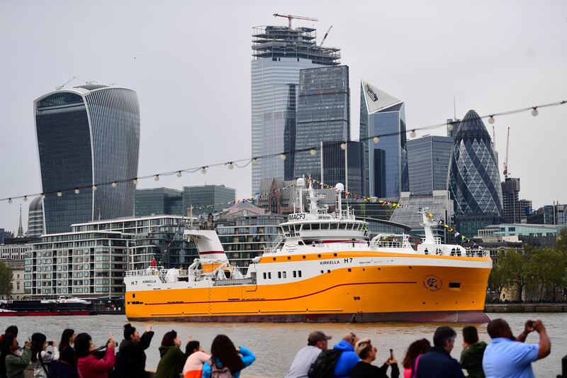 The UKÃ•s newest distant waters fishing trawler, the 4,000 tonne, 81 metre-long Kirkella makes her way back to Greenwich after having passed under Tower Bridge in London after travelling up the Thames from Tilbury. (Photo by Victoria Jones/PA Images via Getty Images)