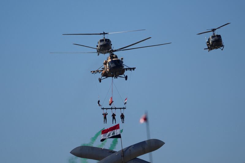 Iraqi Army helicopters at the Monument of the Unknown Soldier during the Army Day celebrations in Baghdad, Iraq. Reuters