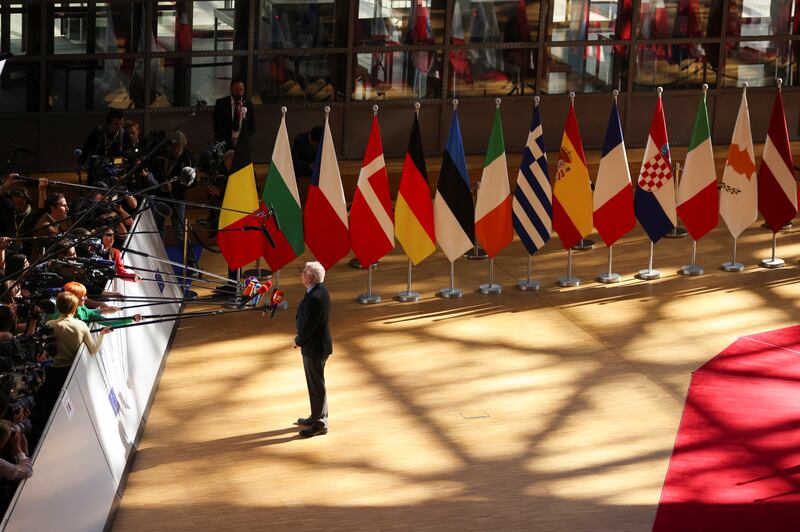 Josep Borrell speaks to the media as he arrives. Reuters