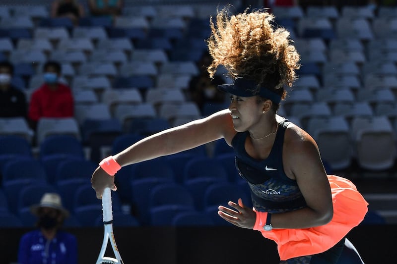 Naomi Osaka serves to Ons Jabeur during their third round match at the Australian Open. AFP