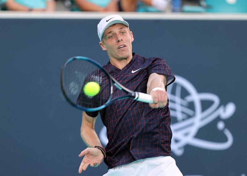 Denis Shapovalov hits a backhand to Taylor Fritz. Reuters