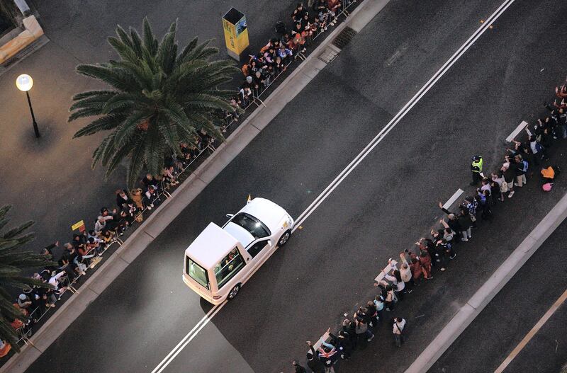 SYDNEY, AUSTRALIA - JULY 17:  The Holy Father His Holiness Pope Benedict XVI travels in his 'Pope Mobile' through the Sydney CBD from Barangaroo to St Mary's Cathedral House following his words to pilgrims at the official Papal welcome ceremony at Barangaroo on July 17, 2008 in Sydney, Australia. Organised every two to three years by the Catholic Church, World Youth Day (WYD) is an invitation from the Pope to the youth of the world to celebrate their faith. The celebration, being held in Sydney from July 15 to July 20, 2008, will mark the first visit of His Holiness Pope Benedict XVI to Australia.  (Photo by Cameron Spencer/Getty Images)