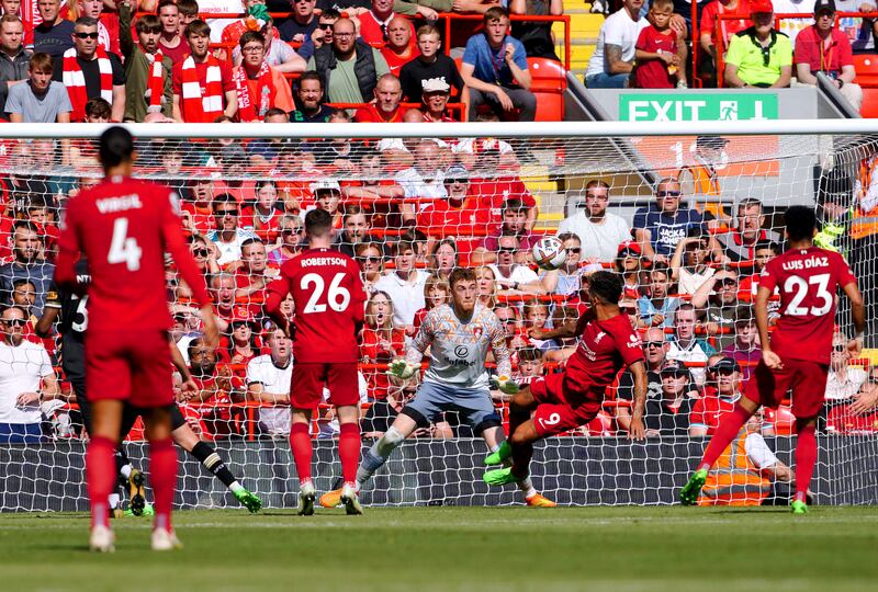 Liverpool's Roberto Firmino scores his side's fourth goal on Saturday. AP