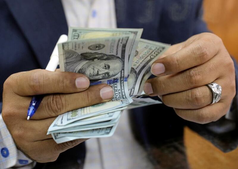 As well as political turbulence, macro-economic factors such as public sector debt are weighing heavily on the dollar. Mohamed El Ghany / Reuters