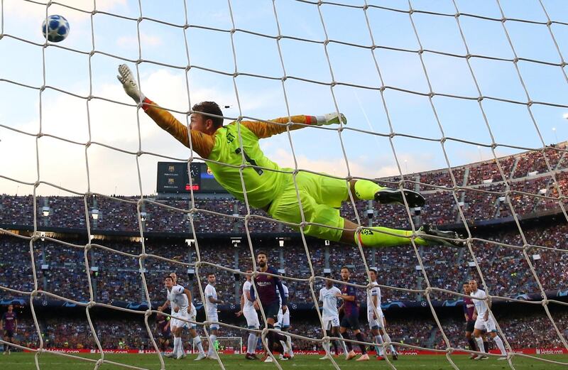 PSV Eindhoven's Jeroen Zoet can only watch as Lionel Messi's free kick flies into the net, putting Barcelona 1-0 up. Reuters